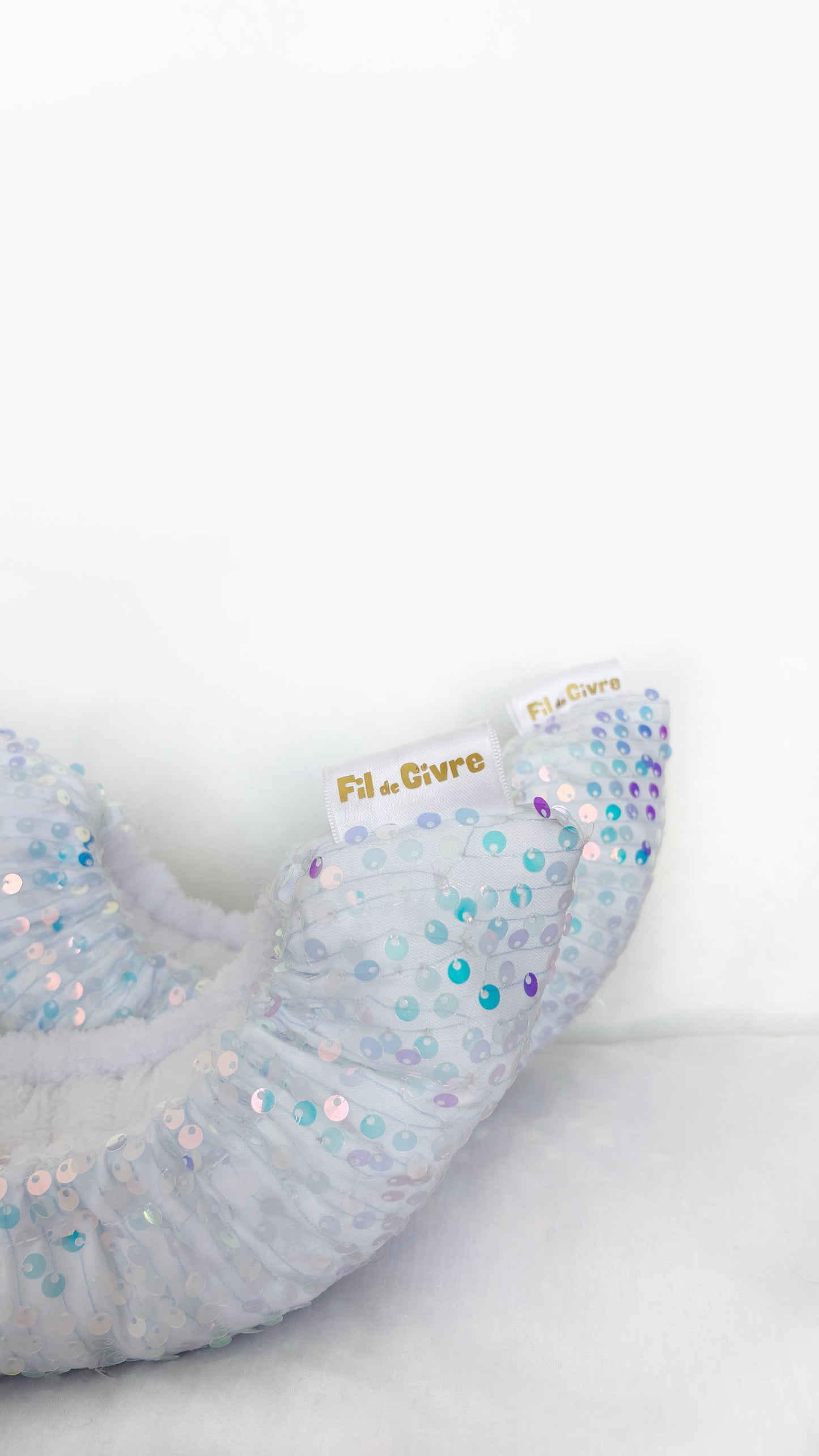 Protège-lames à sequins